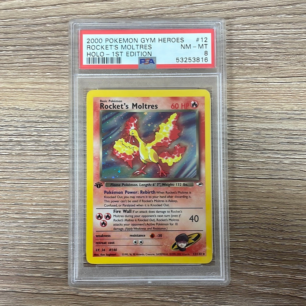 PSA 8 NM - MT - Rocket's Moltres 12/132 1st Edition Gym Heroes Holo Po PSA 8 NM - MT - Rocket's Moltres 12/132 1st Edition Gym Heroes Holo Po