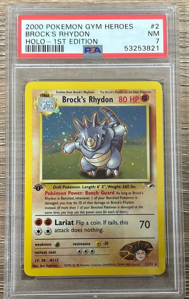 PSA 7 NM - Brock’s Rhydon 2/132 1st Edition Gym Heroes Holo Pokemon